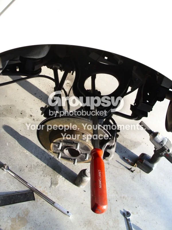 Clock the rear control-arm bushings at ride height