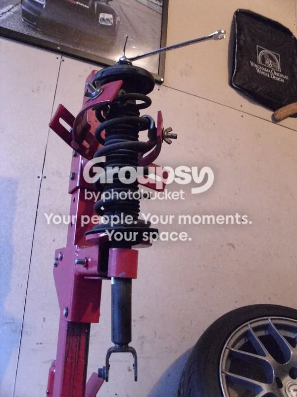 Install the rear coilover and set its height
