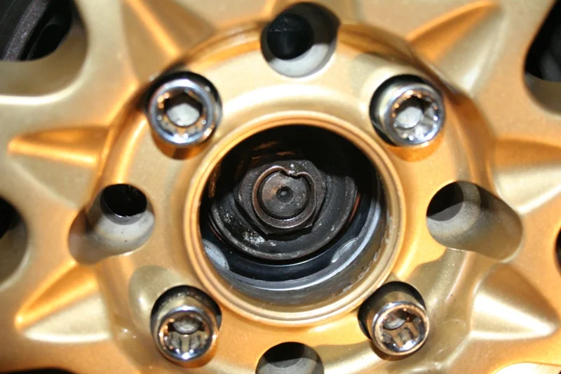 Crack the 32mm axle nut loose