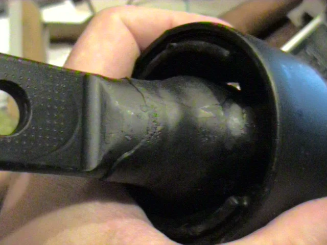Mark and remove the toe adjustment bolt