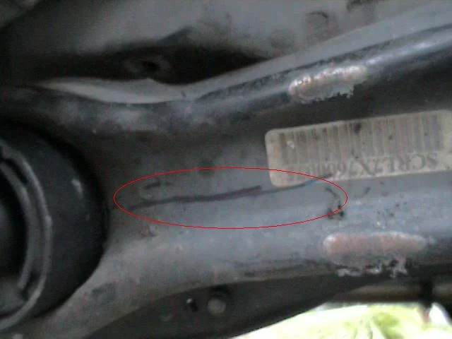 Press the old bushing out