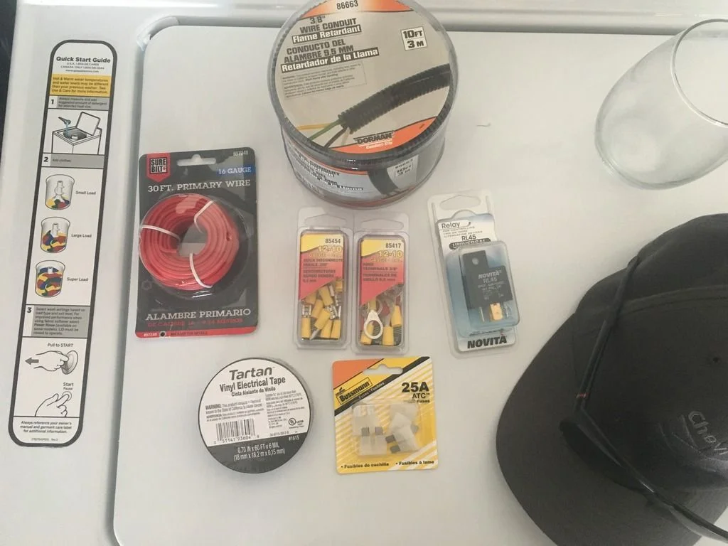 Run the 10 AWG power cable from the battery to the rear seat