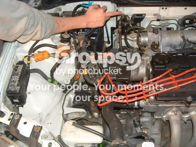 Remove the factory intake and exhaust manifold