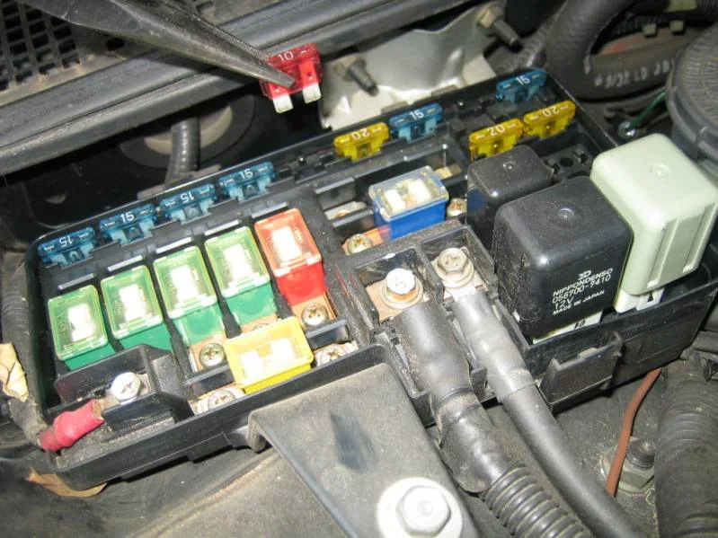 Unbolt the brackets and unplug the ECU