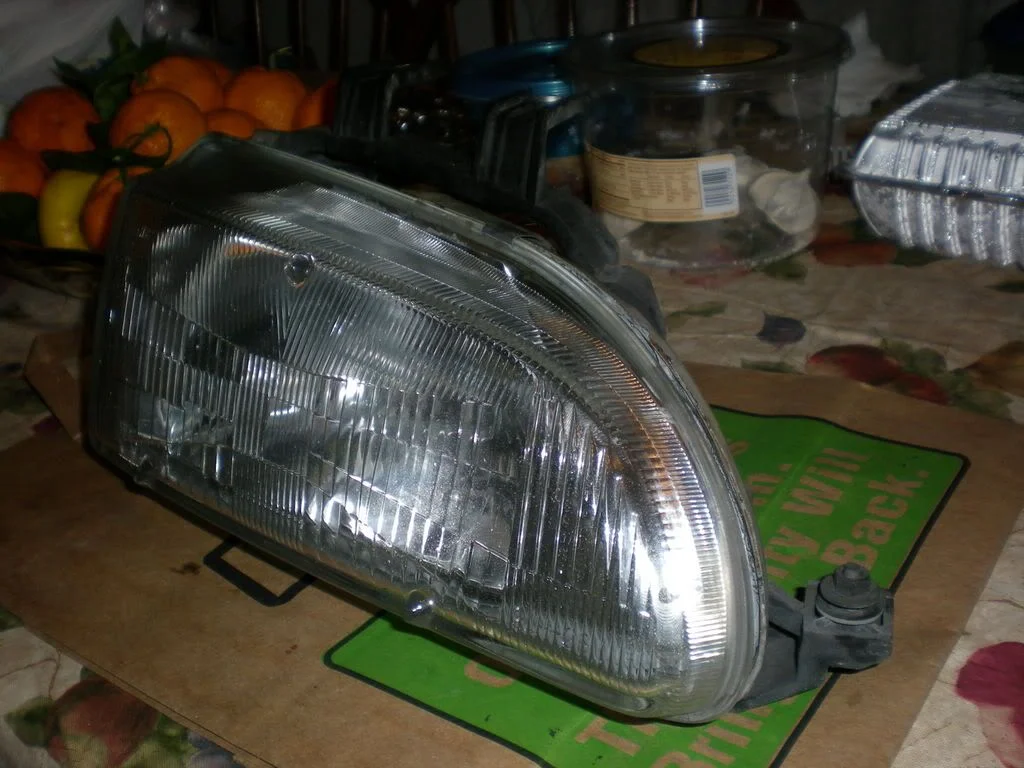 Remove the headlights from the car