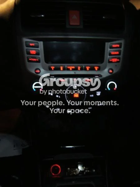 Convert the seat heater, hazard, VSA and sunroof switches and reassemble