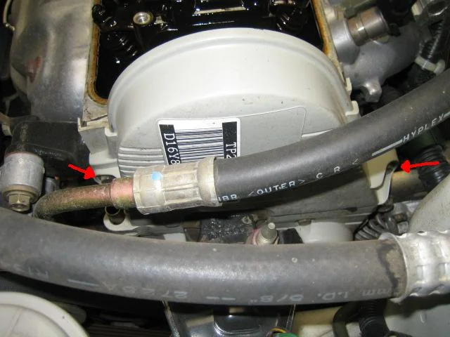 Remove the upper timing belt cover