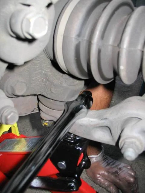 Separate the driveshafts from the transmission