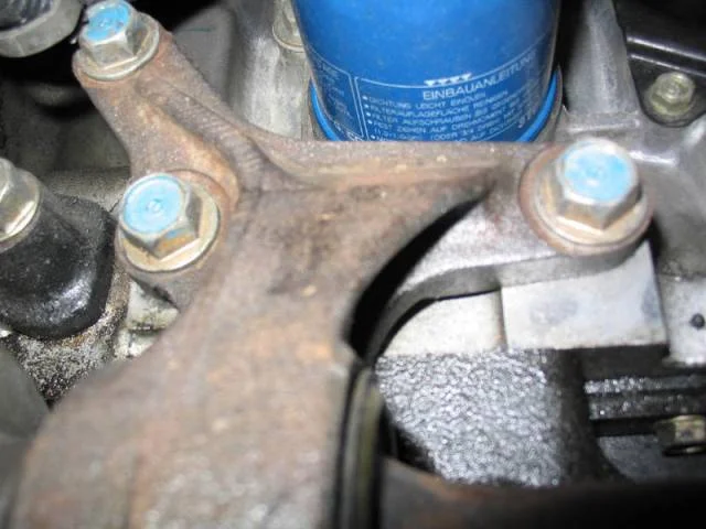 Support the engine and unbolt the transmission
