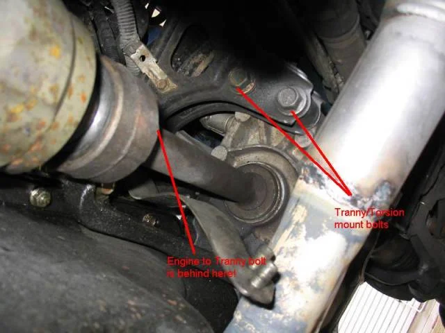 Remove the starter motor and clutch slave cylinder