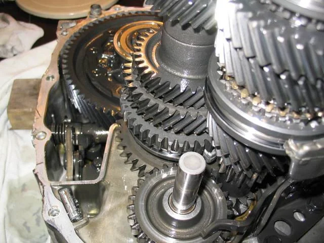 Drive out the input shaft bearing and oil seal