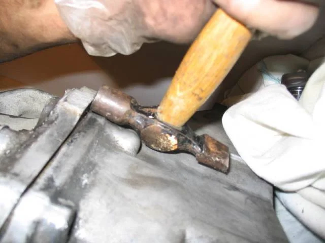 Remove the gearsets, shift forks and differential